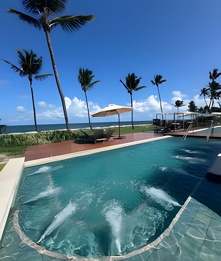 Apartamento beira-mar /resort pé na areia