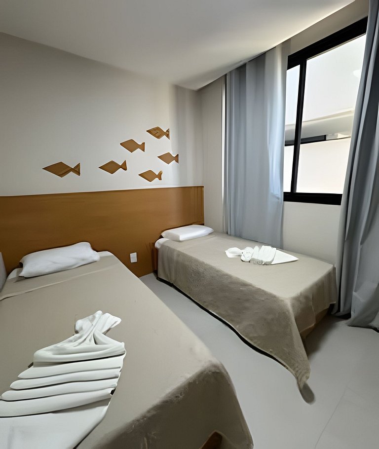 Ap 2 quartos resort beira-mar