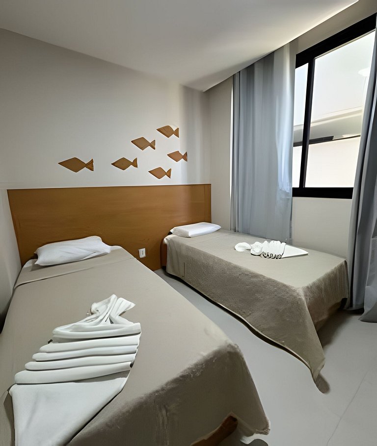 Ap 2 quartos resort beira-mar